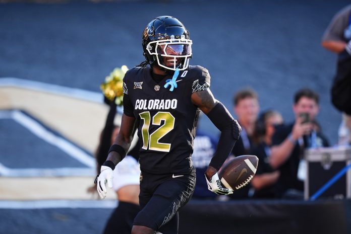 Colorado Buffaloes wide receiver Travis Hunter (12) reacts after scoring a touchdown in the first half against the North Dakota State Bison at Folsom Field. Mandatory Credit: Ron Chenoy-USA TODAY Sports