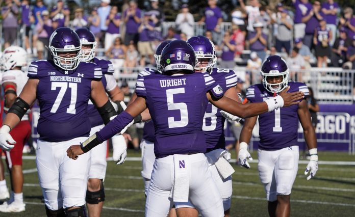 Northwestern Wildcats quarterback Mike Wright (5) celebrates a touchdown against the Miami (Oh) Redhawks during the second half at Lanny and Sharon Martin Stadium. Can they beat Duke?