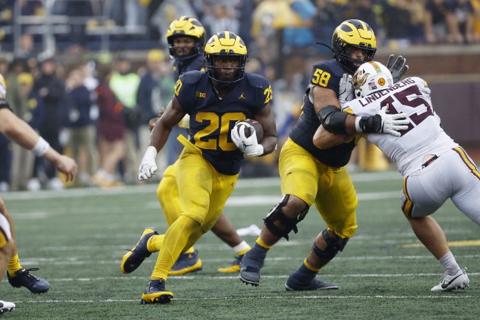 Can the Woverines' one-dimensional offensive attack succeed when away from Ann Arbor? Find out that and more in our Michigan vs. Washington prediction.