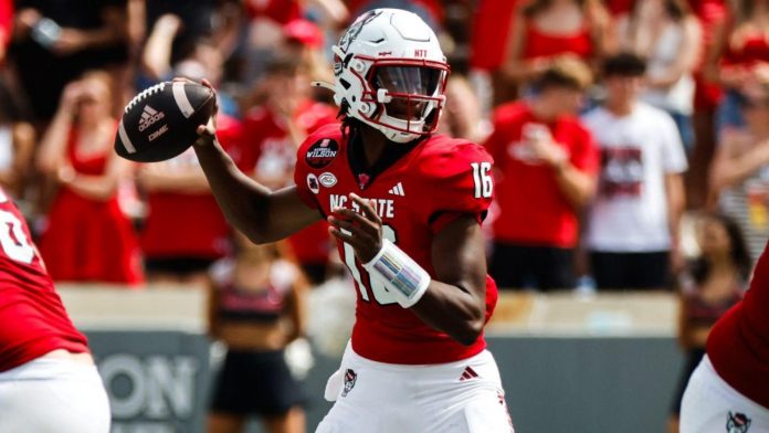 North Carolina State Wolfpack quarterback CJ Bailey (16) throws the ball during the second half against the Louisiana Tech Bulldogs at Carter-Finley Stadium. Mandatory Credit: Jaylynn Nash-Imagn Images