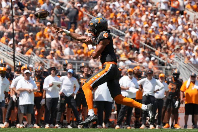 Tennessee quarterback Nico Iamaleava (8) throws a pass during a game between Tennessee and Chattanooga, Saturday, Aug. 31, 2024. How does he play into our NC State vs. Tennessee prediction?