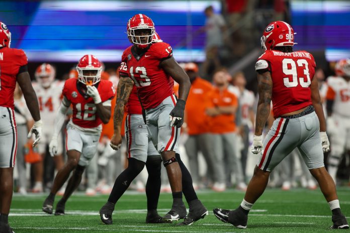 Georgia Bulldogs defensive lineman Mykel Williams (13) celebrates after a tackle against the Clemson Tigers in the third quarter at Mercedes-Benz Stadium. Mandatory Credit: Brett Davis-USA TODAY Sports