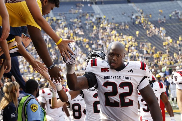 Sep 14, 2024; Ann Arbor, Michigan, USA; Arkansas State Red Wolves defensive end Jayden Jones (22) walks off the field after a game against the Michigan Wolverines at Michigan Stadium. Mandatory Credit: Rick Osentoski-Imagn Images