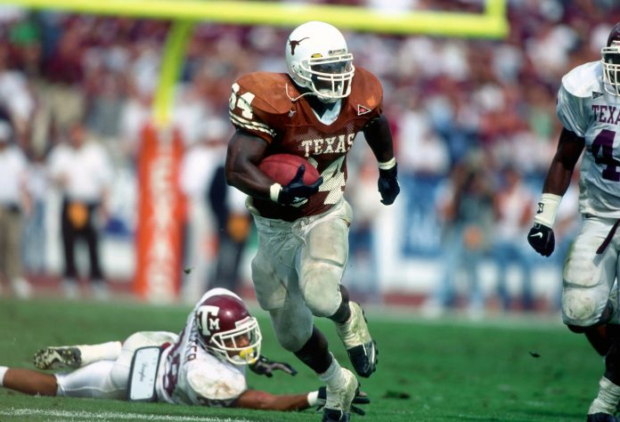 Texas Longhorns running back #34 Ricky Williams in action against the Texas A&M Aggies. Mandatory Credit: Photo By USA TODAY Sports (c) Copyright USA TODAY Sports