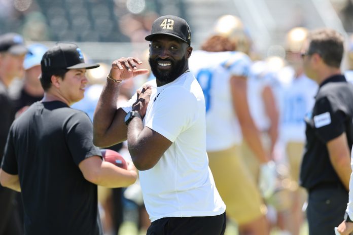 Aug 31, 2024; Honolulu, Hawaii, USA; UCLA Bruins head coach DeShaun Foster is seen before the start of an NCAA college football game against Hawaii at the Clarence T.C. Ching Athletics Complex. Mandatory Credit: Marco Garcia-USA TODAY Sports