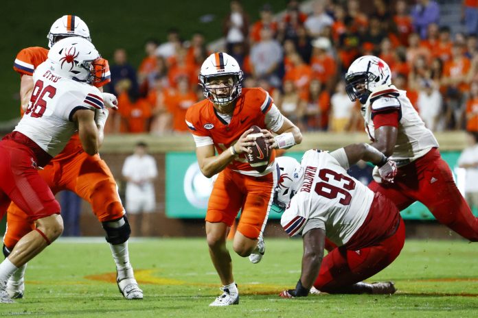 Virginia Cavaliers quarterback Anthony Colandrea (10) runs with the ball during the second half against the Richmond Spiders at Scott Stadium. Mandatory Credit: Amber Searls-USA TODAY Sports