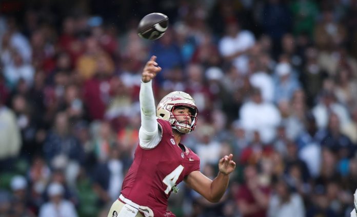 Florida State University quarterback DJ Uiagalelei passes the ball against Georgia Tech at Aviva Stadium. Mandatory Credit: Tom Maher/INPHO via USA TODAY Sports