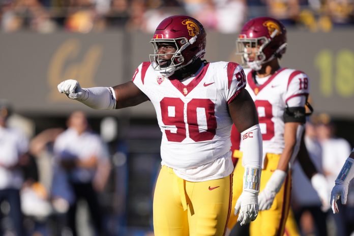 USC Trojans defensive lineman Bear Alexander (90) gestures during the third quarter against the California Golden Bears at California Memorial Stadium.