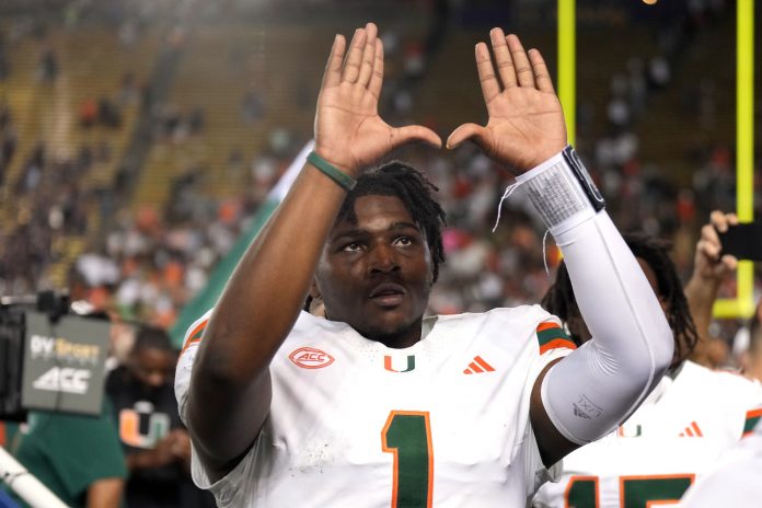 Miami Hurricanes quarterback Cam Ward (1) gestures after defeating the California Golden Bears at California Memorial Stadium.