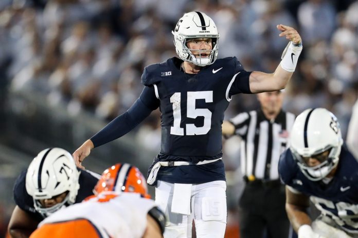 Penn State Nittany Lions quarterback Drew Allar (15) signals during the fourth quarter against the Illinois Fighting Illini at Beaver Stadium. Penn State defeated Illinois 21-7.