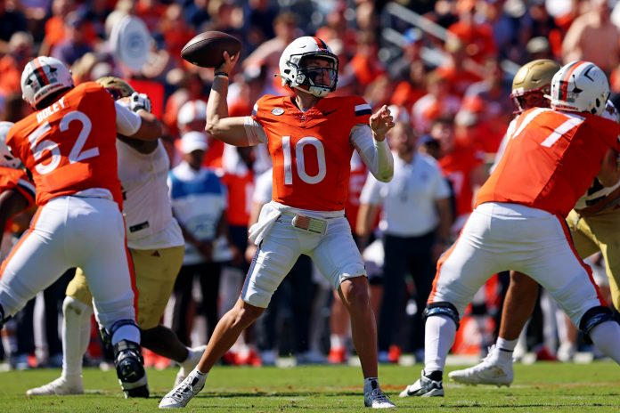 Virginia Cavaliers quarterback Anthony Colandrea (10) throws a pass during the second quarter against the Boston College Eagles at Scott Stadium.