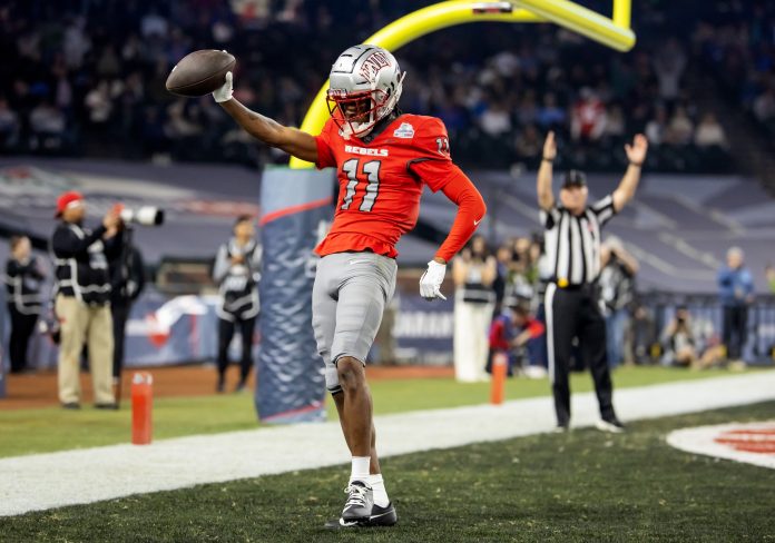 UNLV Rebels wide receiver Ricky White (11) celebrates after scoring a touchdown against the Kansas Jayhawks in the Guaranteed Rate Bowl at Chase Field.