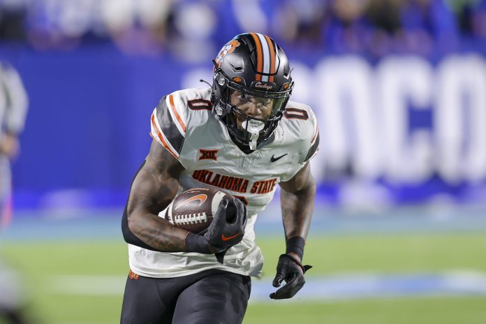 A Week 9 showdown between a hard-hitting Bears linebacker and a standout Cowboys running back takes center stage in our Oklahoma State vs. Baylor prediction.