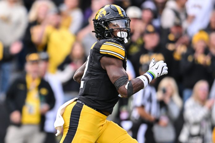 Iowa Hawkeyes running back Kaleb Johnson (2) runs for a touchdown against the Northwestern Wildcats during the third quarter at Kinnick Stadium.