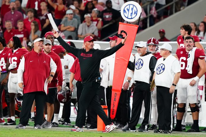 Sep 28, 2024; Tuscaloosa, Alabama, USA; Alabama Crimson Tide head coach Kalen DeBoer asks for a pass interference call against the Georgia Bulldogs during the first half at Bryant-Denny Stadium. Mandatory Credit: John David Mercer-Imagn Images