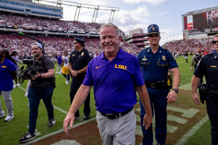 LSU Tigers head coach Brian Kelly smiles after defeating the South Carolina Gamecocks at Williams-Brice Stadium.