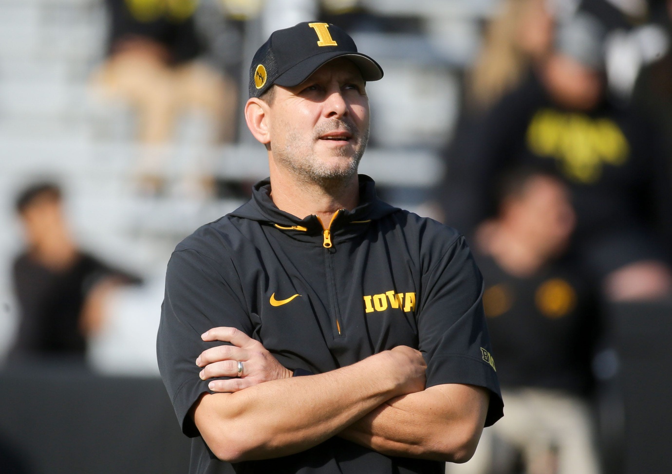 Iowa football’s offensive coordinator Tim Lester watches warmups before the game against Washington Saturday, Oct. 12, 2024 at Kinnick Stadium in Iowa City, Iowa.