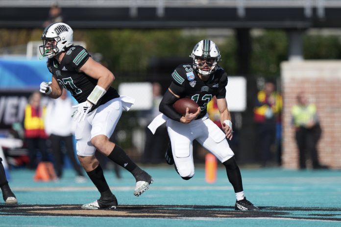 Ohio Bobcats quarterback Parker Navarro (13) runs the ball in the first half against the Georgia Southern Eagles at Brooks Stadium.