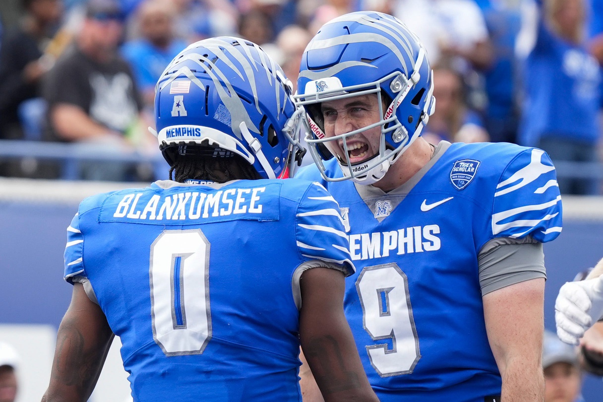 Memphis' Demeer Blankumsee (0) and Seth Henigan (9) celebrate after Blankumsee scored a touchdown during the game between Charlotte and the University of Memphis at Simmons Bank Liberty Stadium on Saturday, October 26, 2024.