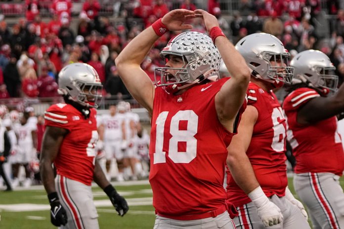 Ohio State Buckeyes quarterback Will Howard (18) celebrates during the second half of the NCAA football game against the Indiana Hoosiers at Ohio Stadium in Columbus.