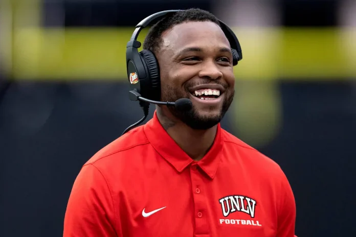 Offensive coordinator Brennan Marion laughs from the sidelines during the UNLV spring showcase game at Allegiant Stadium on Saturday, April 8, 2023, in Las Vegas. (Ellen Schmidt/Las Vegas Review-Journal)