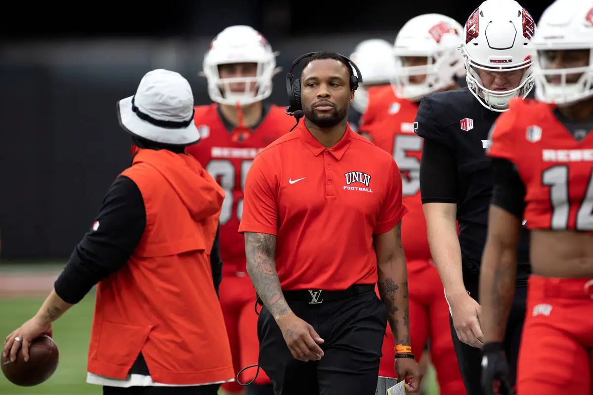 Offensive coordinator Brennan Marion coaches from the sidelines during the UNLV spring showcase game at Allegiant Stadium on Saturday, April 8, 2023, in Las Vegas. (Ellen Schmidt/Las Vegas Review-Journal) @ellenschmidttt