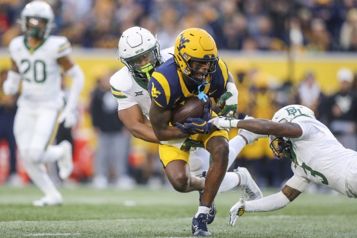 As the Mountaineers were attempting a come back, West Virginia WR Traylon Ray suffered a severe injury against Baylor late in the game. Here's the latest.