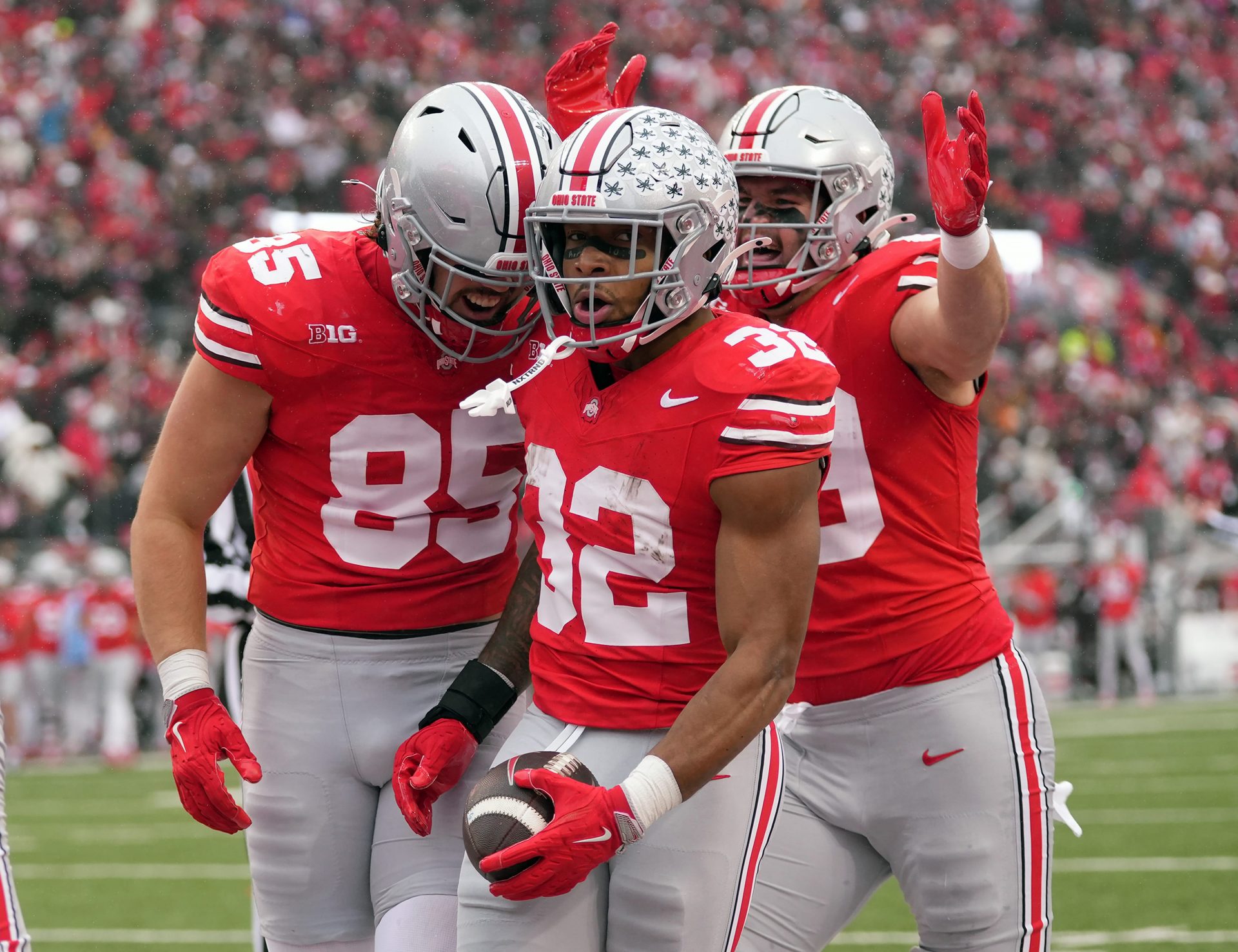 Ohio State Buckeyes running back TreVeyon Henderson (32) celebrates his touchdown against Indiana Hoosiers during the second quarter of the football game in Columbus on Saturday, Nov. 23, 2024.