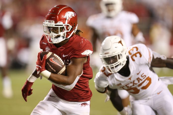 Arkansas Razorbacks running back AJ Green (0) rushes for a touchdown in the second half against the Texas Longhorns at Donald W. Reynolds Razorback Stadium. Arkansas won 40-21.