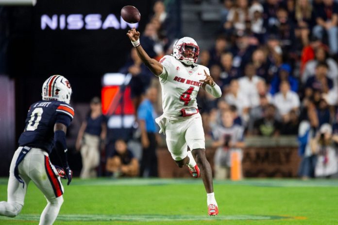 New Mexico Lobos quarterback Devon Dampier (4) throws the ball as Auburn Tigers take on New Mexico Lobos at Jordan-Hare Stadium in Auburn, Ala., on Saturday, Sept. 14, 2024. Auburn Tigers defeated New Mexico Lobos 45-19.