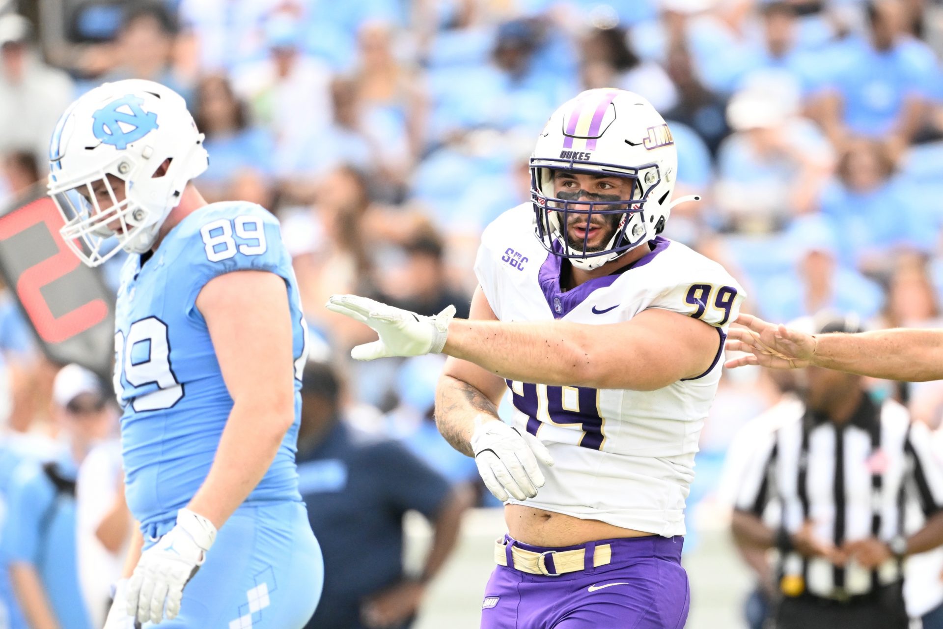 James Madison Dukes defensive lineman Eric O'Neill (99) reacts in the second quarter at Kenan Memorial Stadium.