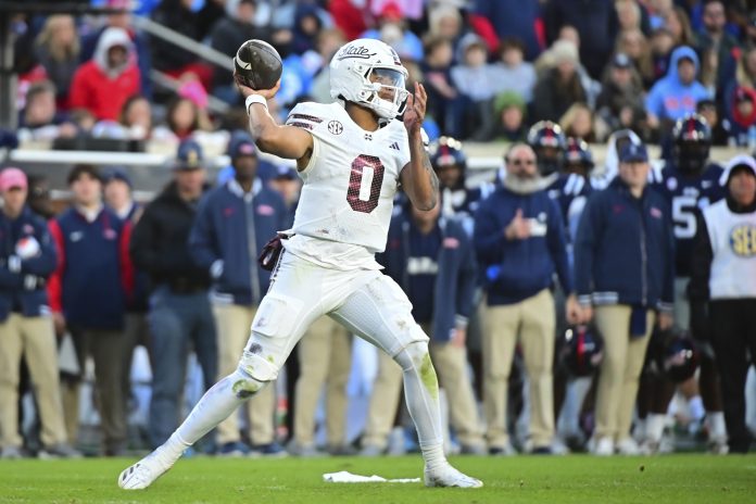 Mississippi State Bulldogs quarterback Michael Van Buren Jr. (0) looks to pass against Mississippi during the second quarter at Vaught-Hemingway Stadium.