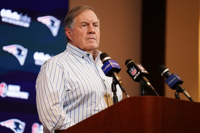 New England Patriots head coach Bill Belichick talks to reporters after the game against the New York Jets at Gillette Stadium.