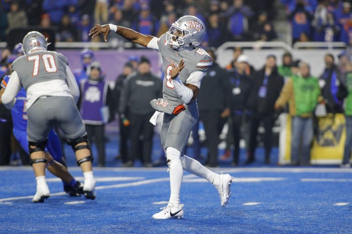 UNLV Rebels quarterback Hajj-Malik Williams (6) throws down field against the Boise State Broncos at Albertsons Stadium.