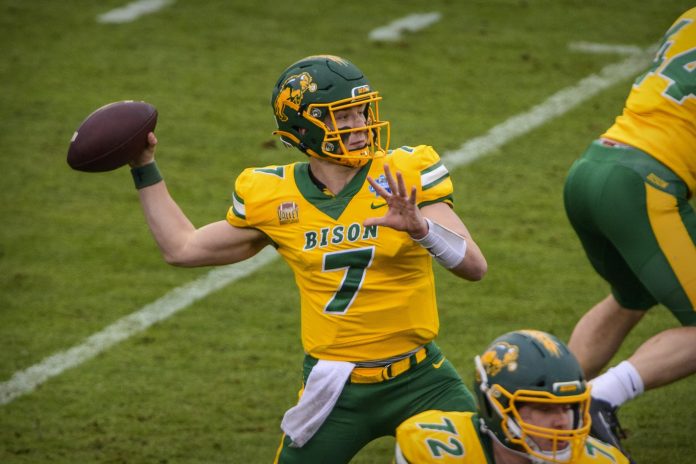 North Dakota State Bison quarterback Cam Miller (7) passes against the Montana State Bobcats during the first half of the FCS Championship at Toyota Stadium.