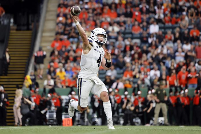 Montana State Bobcats quarterback Tommy Mellott (4) throws the ball during the first half against the Oregon State Beavers at Providence Park.