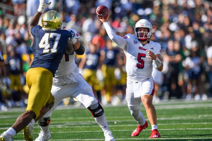 Miami Redhawks quarterback Brett Gabbert (5) throws in the second quarter against the Notre Dame Fighting Irish at Notre Dame Stadium.