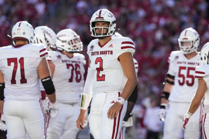 South Dakota Coyotes quarterback Aidan Bouman (2) during the game against the Wisconsin Badgers at Camp Randall Stadium.