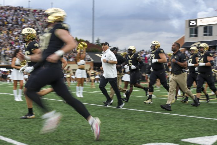 For the first time since 2013, Dave Clawson won't roam the sidelines for the Wake Forest Demon Deacons. But his career at Wake is far from over.