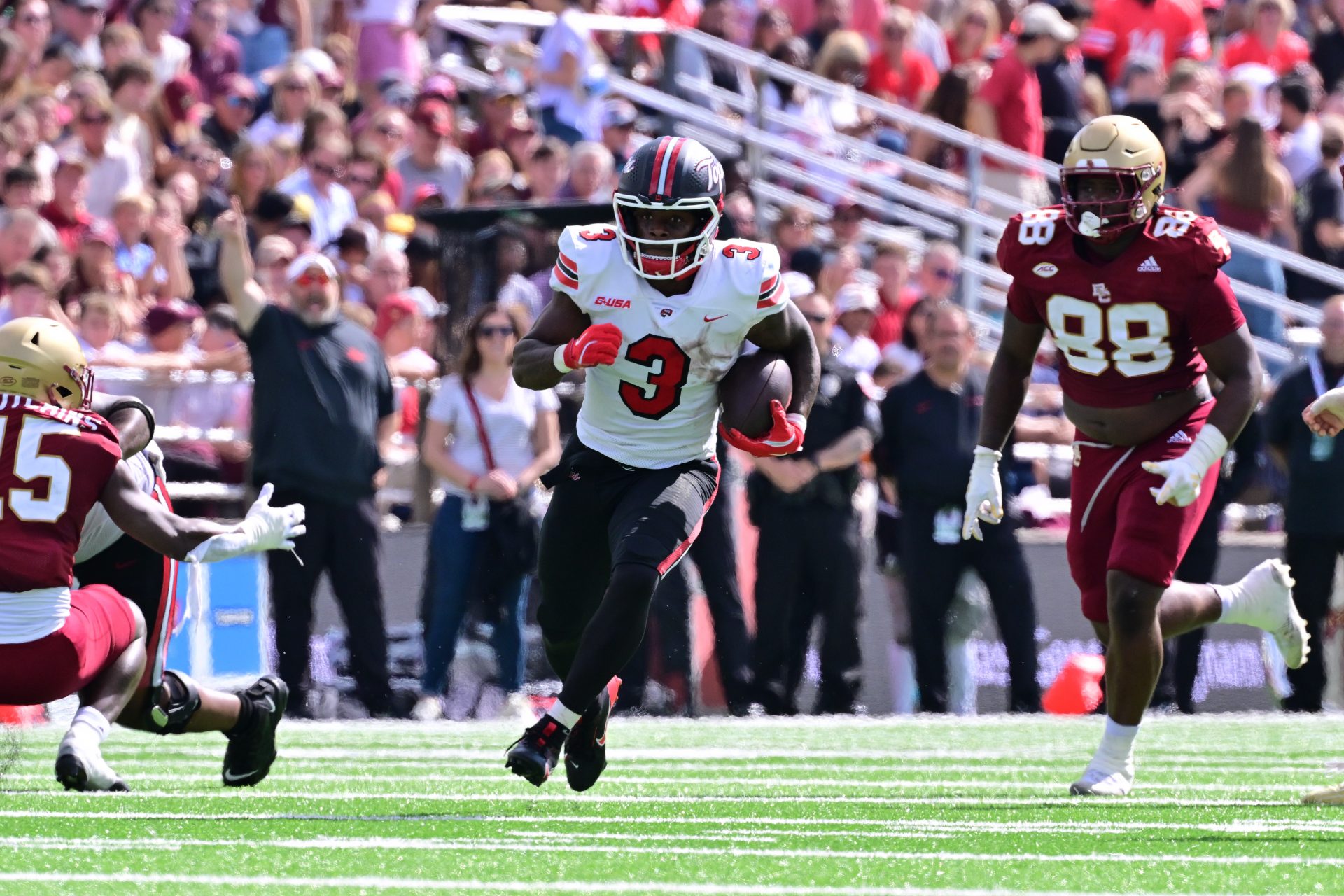 Western Kentucky Hilltoppers running back Elijah Young (3) runs the ball against the Boston College Eagles during the first half at Alumni Stadium.