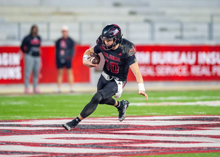 Louisiana quarterback Ben Wooldridge runs the ball as Louisianas Ragin Cajuns take on South Alabama at Cajun Field in Lafayette, LA. Saturday, Nov. 16, 2024.