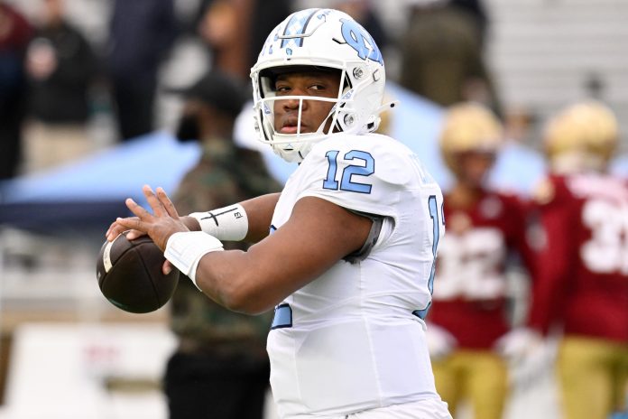 North Carolina Tar Heels quarterback Jacolby Criswell (12) warms up before a game against the Boston College Eagles at Alumni Stadium.