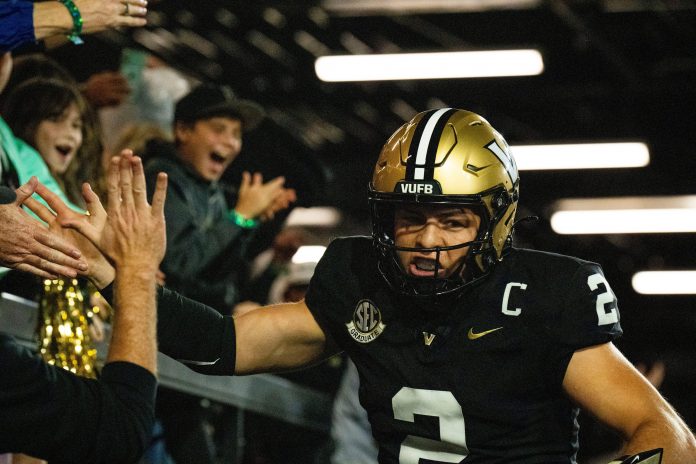 Vanderbilt Commodores quarterback Diego Pavia (2) celebrates with the fans after scoring a touchdown against South Carolina Gamecocks during the third quarter at FirstBank Stadium in Nashville, Tenn., Saturday, Nov. 9, 2024.