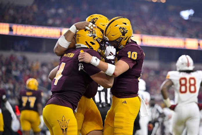 Arizona State quarterback Sam Leavitt is ready to go toe to toe with Texas' Quinn Ewers as the two face off in the Peach Bowl on Jan. 1.