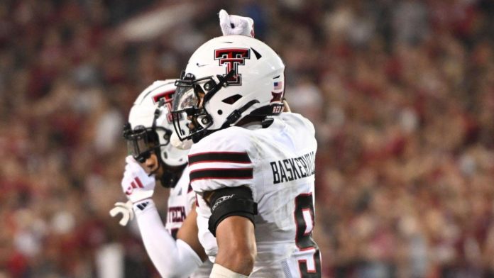 A Texas Tech football player took to social media following an apparently blatant stomp by an Arkansas opponent.