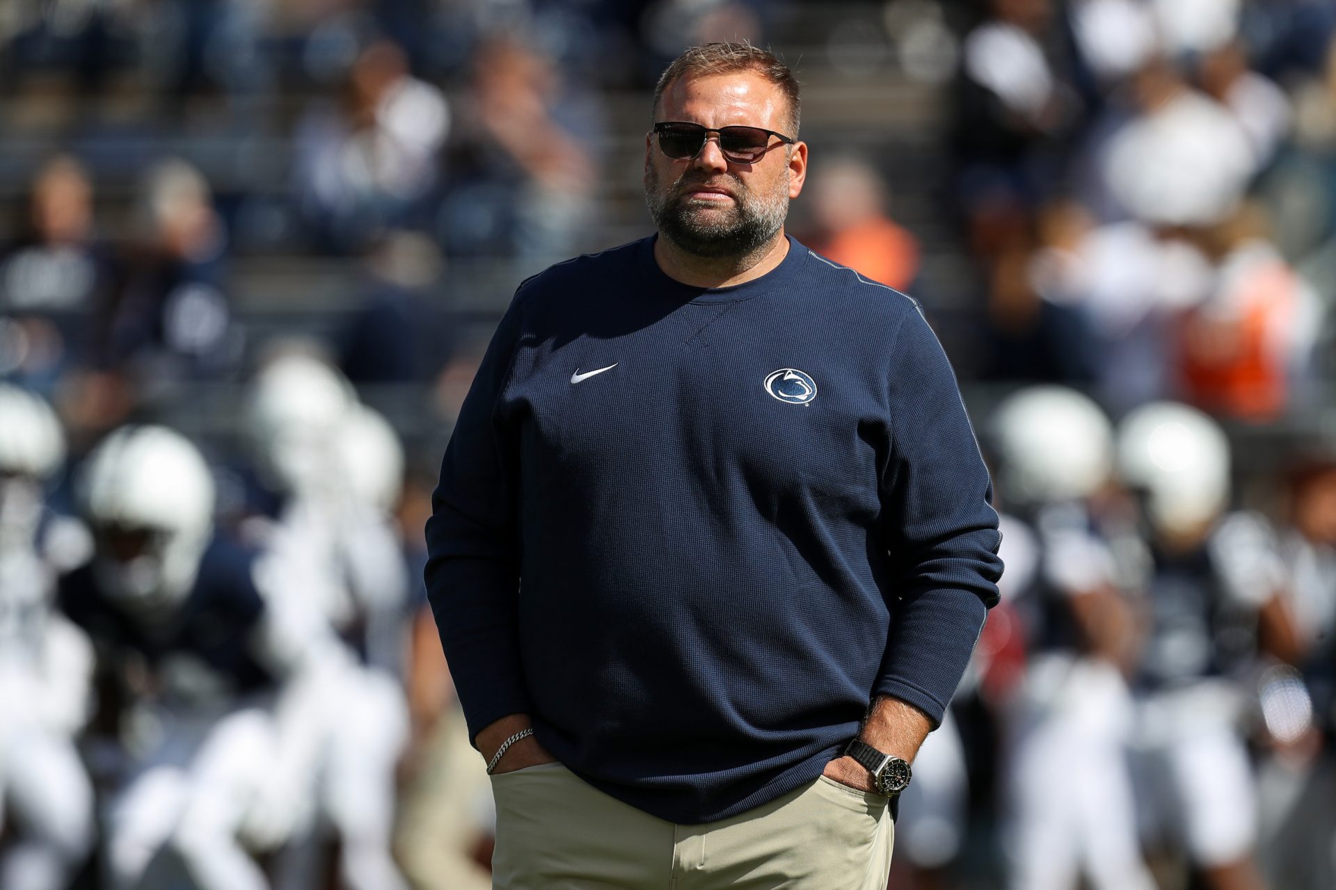 Penn State Nittany Lions offensive coordinator Andy Kotelnicki walks on the field during a warm up prior to the game against the Bowling Green Falcons at Beaver Stadium.