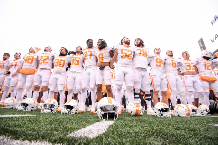 Nov 30, 2024; Nashville, Tennessee, USA; Tennessee Volunteers celebrates the win against the Vanderbilt Commodores during the second half at FirstBank Stadium. Mandatory Credit: Steve Roberts-Imagn Images