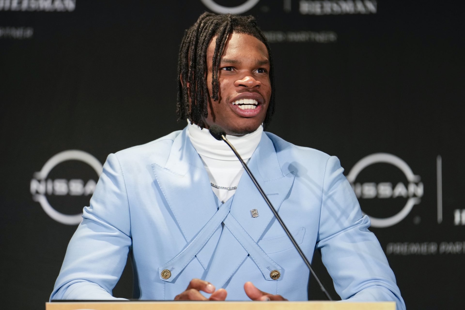 Colorado Buffaloes wide receiver/cornerback Travis Hunter speaks to the press after winning the 2024 Heisman Trophy.