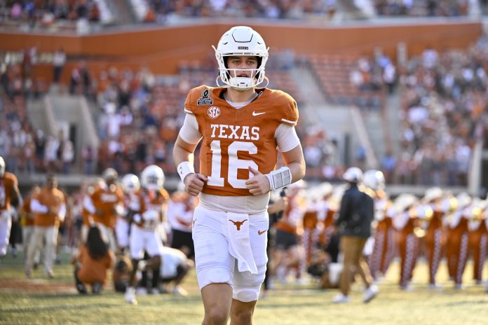 Texas Longhorns quarterback Arch Manning (16) takes the field before the game between the Texas Longhorns and the Clemson Tigers in the CFP National Playoff First Round at Darrell K Royal-Texas Memorial Stadium.