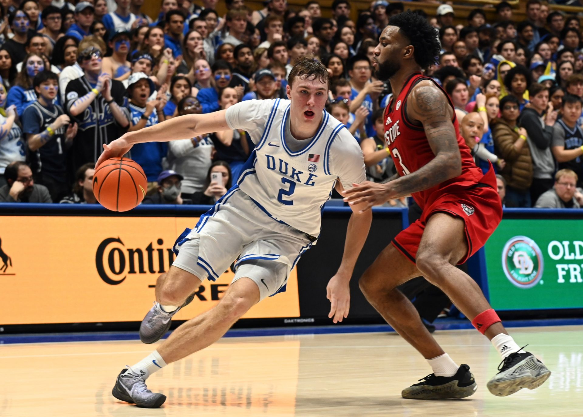 Duke Blue Devils forward Cooper Flagg (2) drives against North Carolina State Wolfpack guard Dontrez Styles (3) during the second half at Cameron Indoor Stadium. The Blue Devils won 74-64.